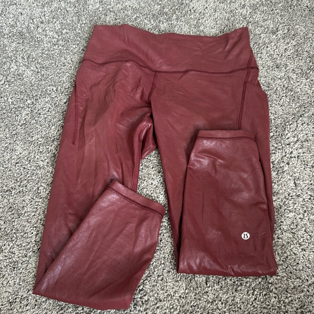 Size 12 maroon color with a shine. Lulu Leggings